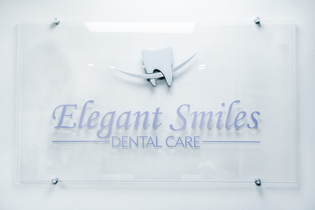 Elegant Smiles Dental Care Sign